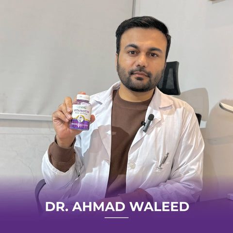 Man in a white coat holding a Vitabiotin 5000 mcg bottle, with text reading “Dr. Ahmad Waleed.”