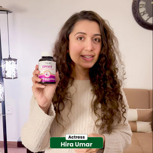 Actress Hira Umar holding NHC Epivit Skin Hair and Nails supplement bottle at home