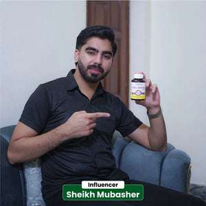 Influencer Sheikh Mubasher pointing to NHC Cod Liver Oil 1000mg supplement for immune and joint health