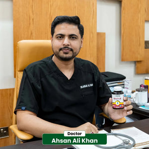 Doctor Ahsan Ali Khan recommending NHC Multi-W One A Day Women multivitamin in office