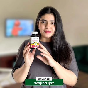 Influencer Wajiha Ijaz holding NHC Multi-W One A Day Women daily multivitamin supplement