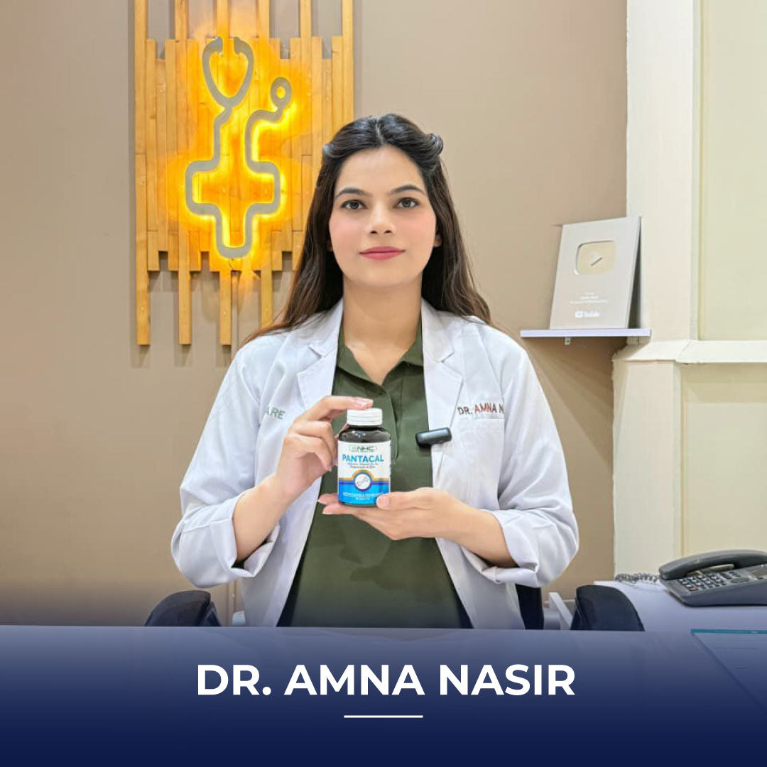 Dr. Amna Nasir, a doctor in a white lab coat, holding a bottle of Pantacal supplement in a medical clinic setting