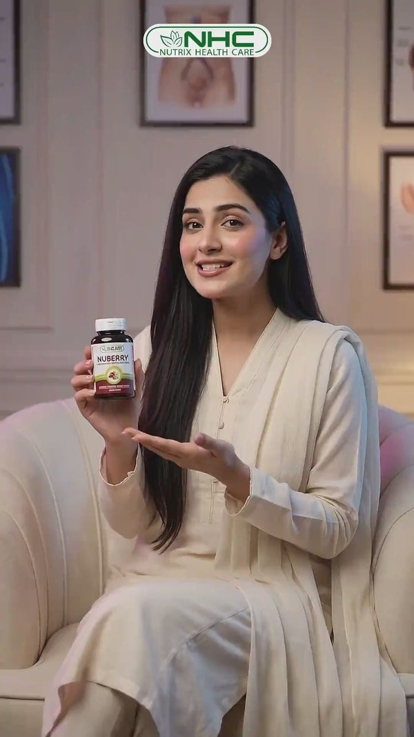 Woman in casual wear holding NHC Nuberry cranberry supplement bottle, testimonial video