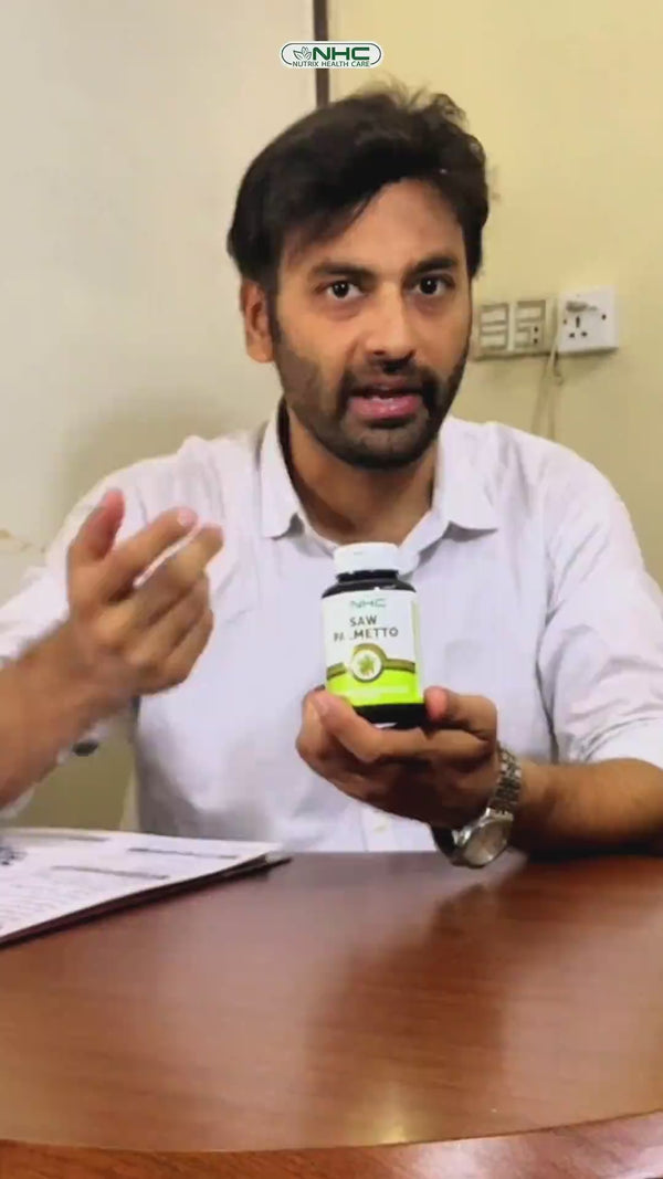 Dr. Hassan holding NHC Saw Palmetto bottle during testimonial video